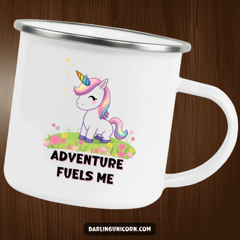 Funny camping mug featuring a cheerful unicorn with a rainbow horn sprinkling stardust over a meadow, designed for outdoor magical experiences.
