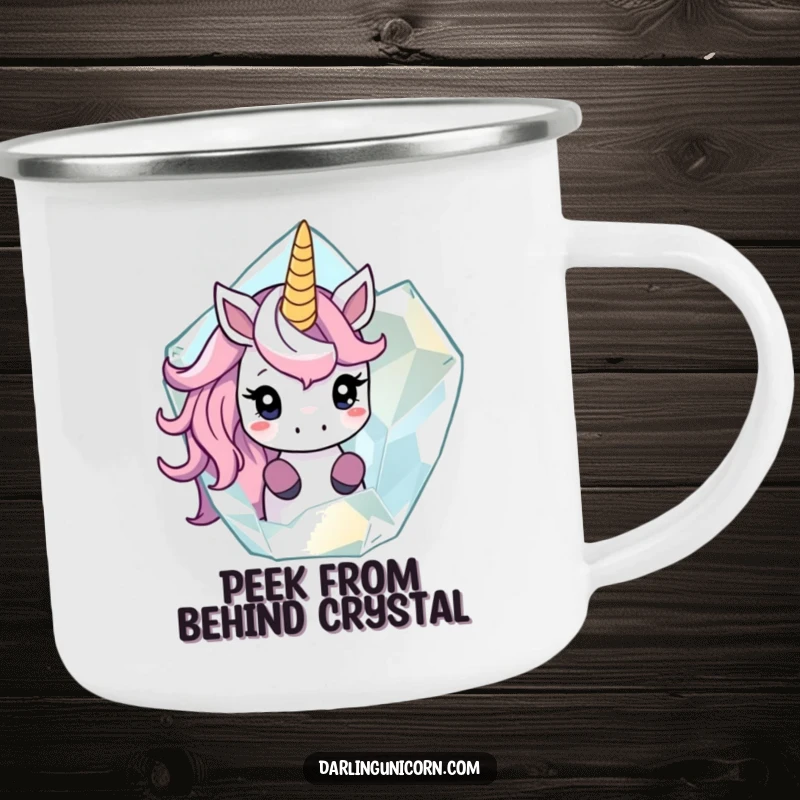 Funny camping mug with a shy unicorn peeking out from behind a large, translucent crystal, perfect for enjoying drinks outdoors.