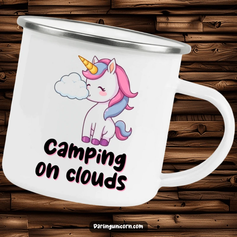 Funny unicorn camping mug with a durable design, showing a unicorn playfully nudging a cloud in an outdoor setting.
