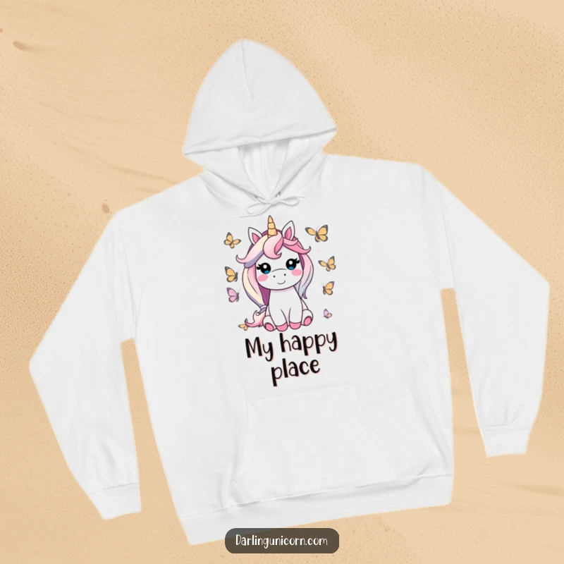 Funny unicorn hoodie showing a contented unicorn smiling, encircled by friendly, colorful butterflies, perfect for cozy and cheerful moments.