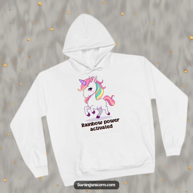 Funny hoodie showing a graceful unicorn prancing with a vibrant rainbow mane, radiating happiness and magical energy.