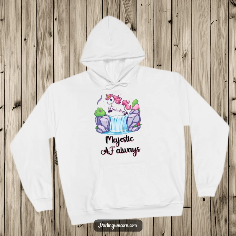 Funny hoodie designed with a majestic unicorn soaring over a shimmering waterfall, offering cozy fantasy and humor.