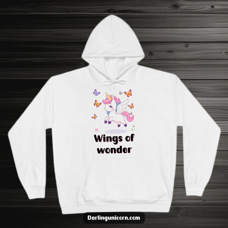 Funny hoodie featuring a unicorn with elegant wings in joyful pursuit of butterflies, radiating enchanting energy.
