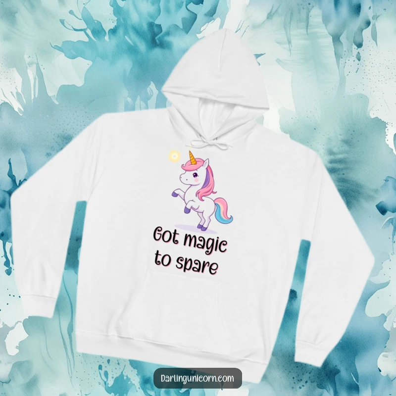 Funny unicorn hoodie with a playful unicorn tossing a brightly shimmering magical orb, ideal for cozying up with a touch of enchantment.