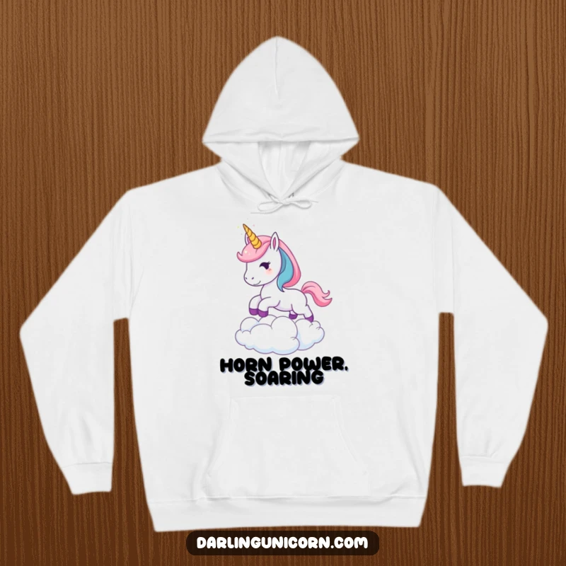 Funny Leaping Unicorn Hoodie: A soft hoodie featuring a young unicorn with a sparkling horn leaping over a cloud, perfect for cozying up with magical fun.
