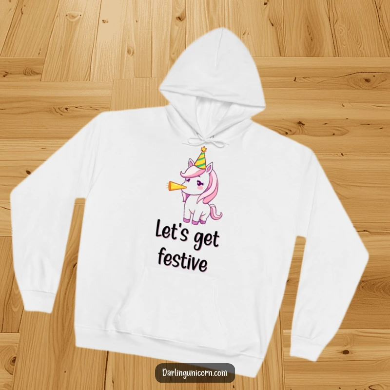 Funny hoodie featuring a unicorn in a party hat, blowing a party horn with great enthusiasm, radiating celebratory vibes.