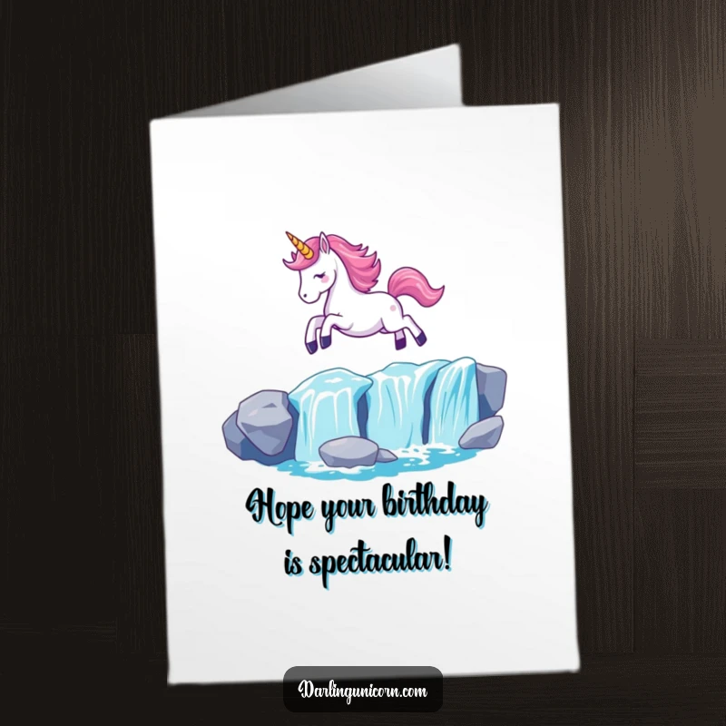 Funny Free Printable Birthday Card: Kawaii unicorn gracefully leaping over a shimmering waterfall, horn aglow.