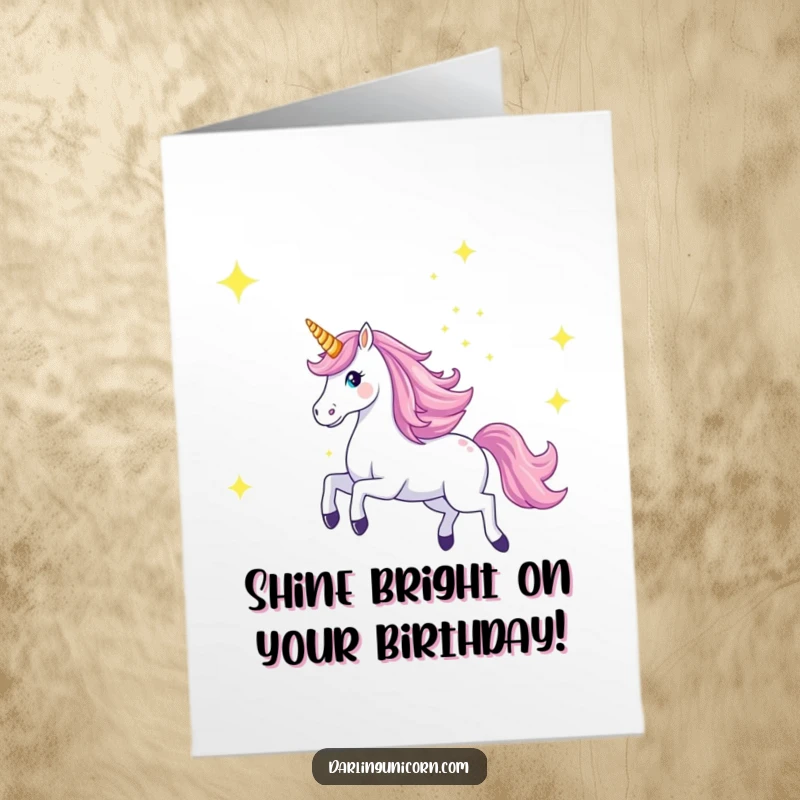 Funny Free Printable Birthday Card: Majestic unicorn gallops across a starry sky, its horn glowing brightly.