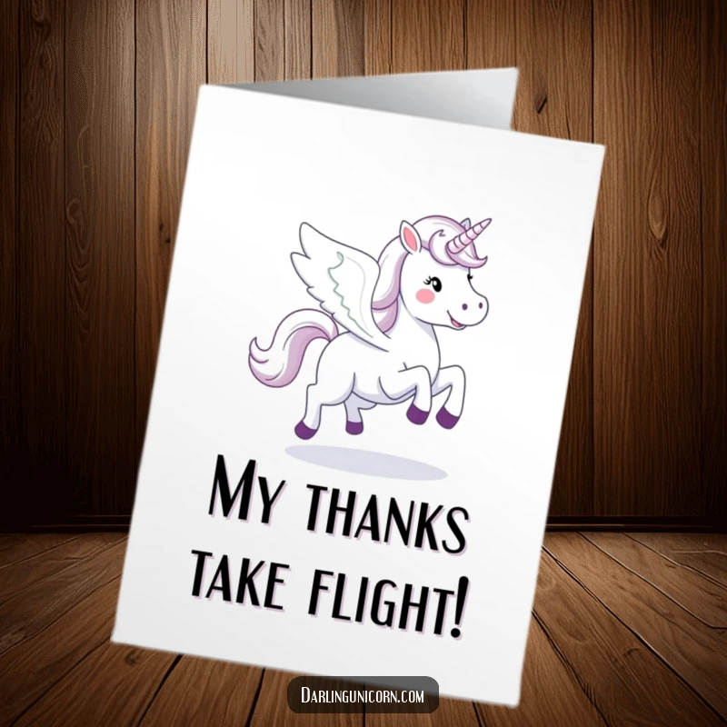 Funny Free Printable Thank You Card: A happy unicorn with wings spread wide, galloping through the sky with gratitude.