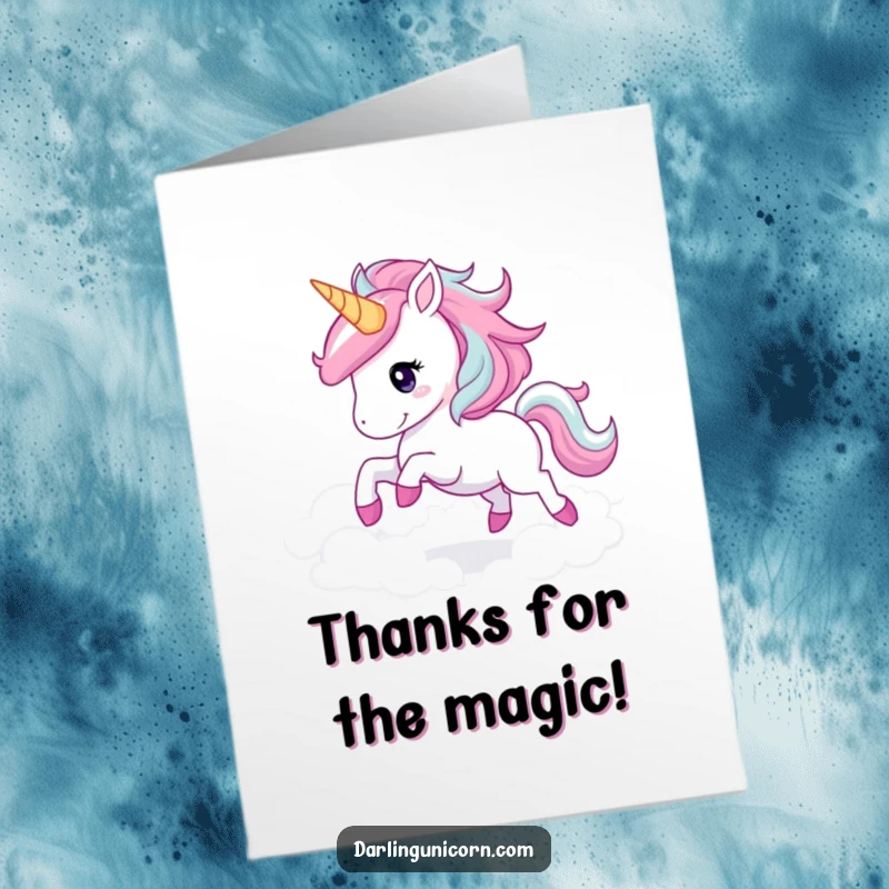 Free printable thank you card: a graceful unicorn with a sparkling mane gallops through clouds, sending thanks.