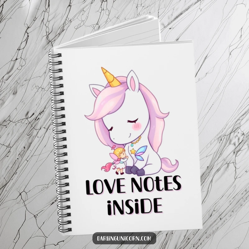 Funny notebook cover showing a unicorn gently nuzzling a tiny fairy, encouraging sweet and magical writing.
