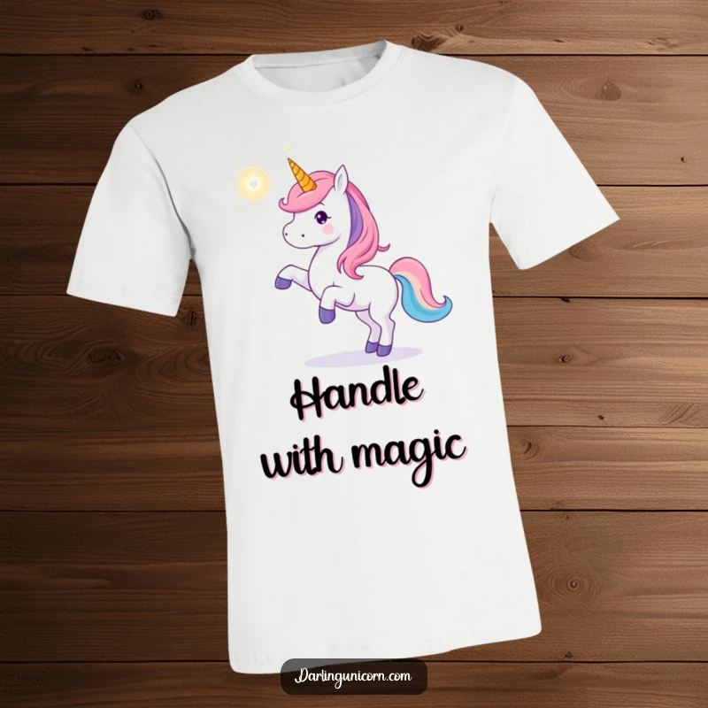 Funny unicorn t-shirt of a unicorn playfully tossing a luminous, shimmering magical orb, radiating fun and enchanting energy.