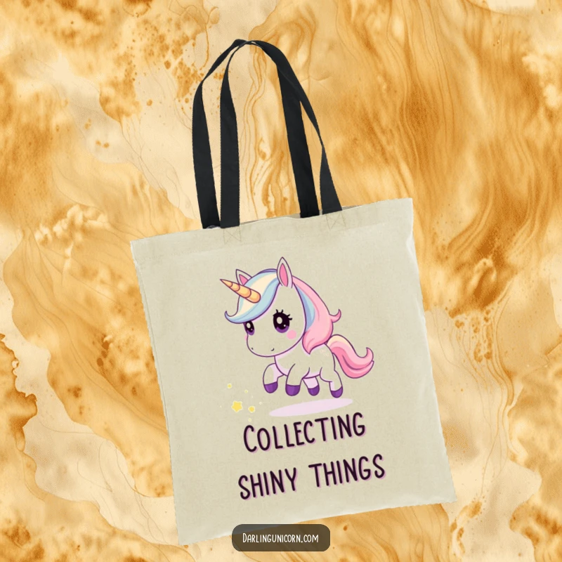 Funny tote bag featuring a kawaii unicorn with curious eyes chasing a magical trail of stardust, perfect for carrying cosmic treasures.